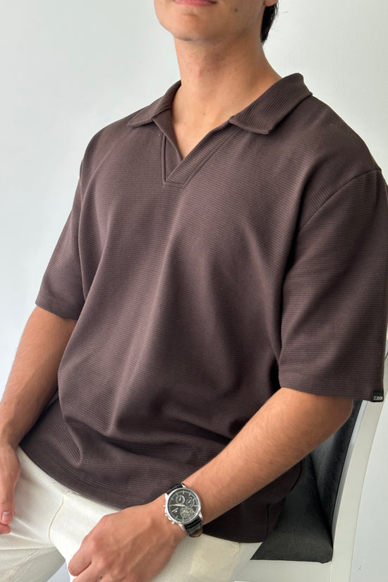 Chomba con textura y cuello polo